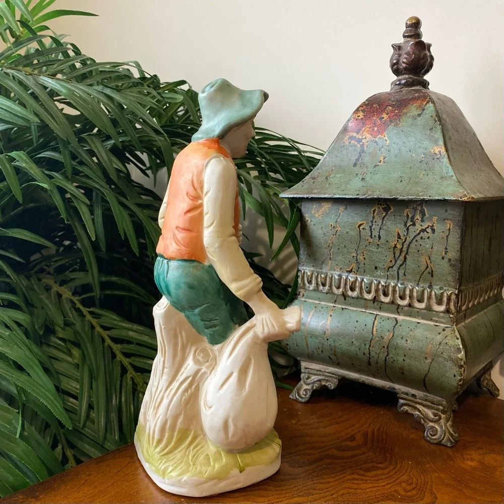 Vintage Ceramic Farmer Figurine in Green and Orange